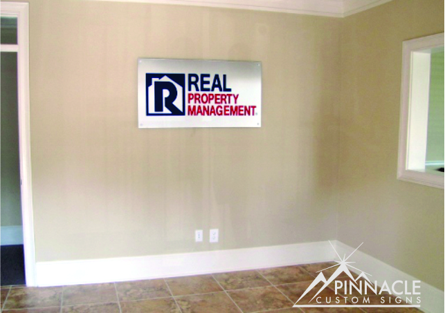 Real Property Management Lobby Sign | Purpose of Corporate Identity