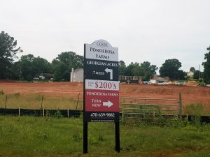 Large Directional Subdivision Sign for Cook Residential