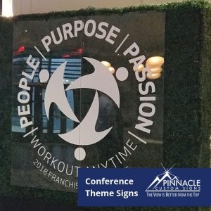 acrylic sign with the conference theme - People, Purpose, Passion